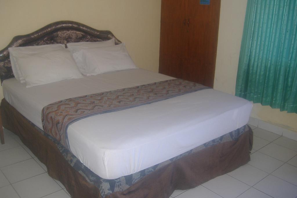 Mustika Inn Kuta Lombok Quarto foto