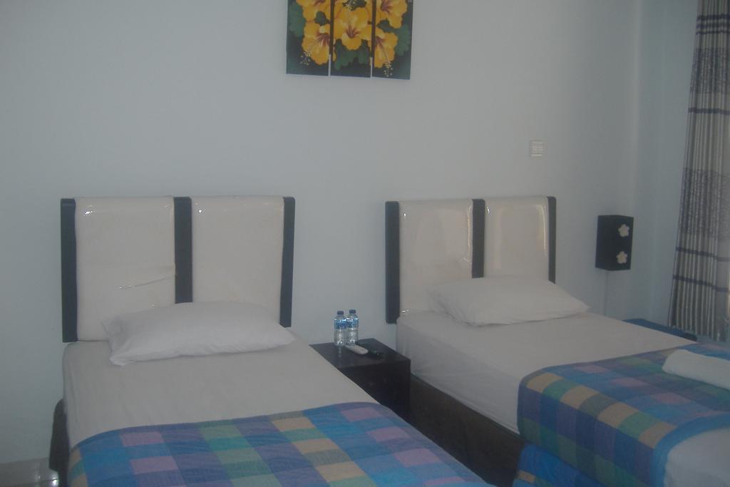 Mustika Inn Kuta Lombok Quarto foto