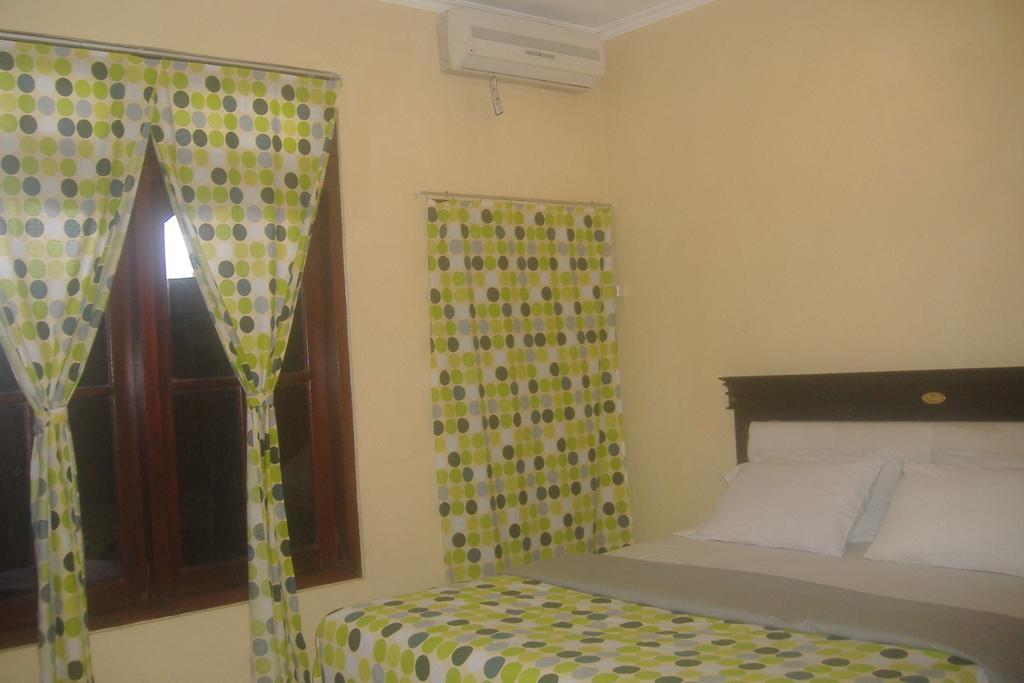 Mustika Inn Kuta Lombok Quarto foto