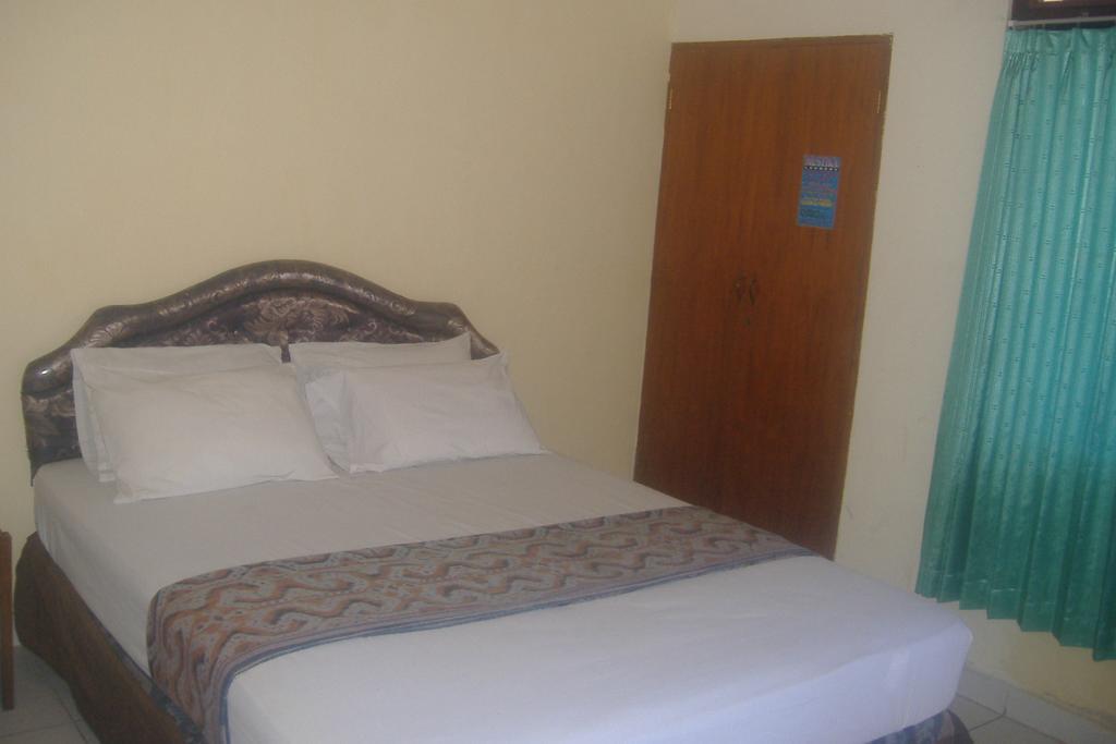 Mustika Inn Kuta Lombok Quarto foto