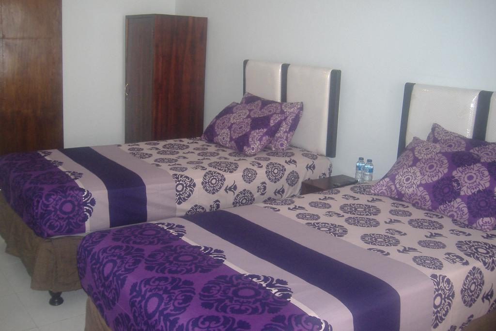 Mustika Inn Kuta Lombok Quarto foto