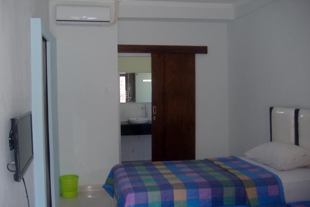 Mustika Inn Kuta Lombok Quarto foto