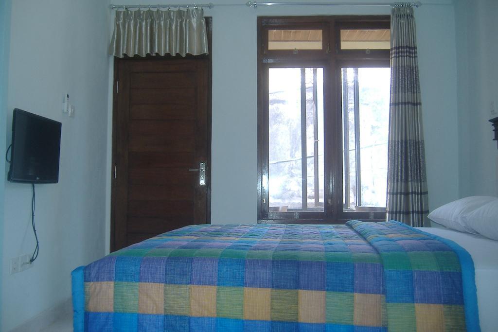 Mustika Inn Kuta Lombok Quarto foto