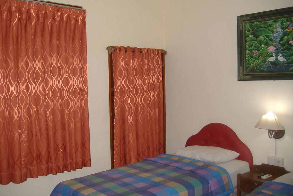 Mustika Inn Kuta Lombok Quarto foto