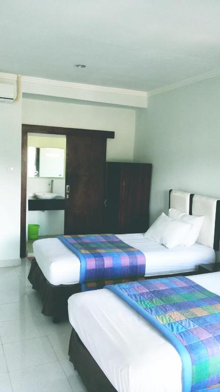 Mustika Inn Kuta Lombok Quarto foto