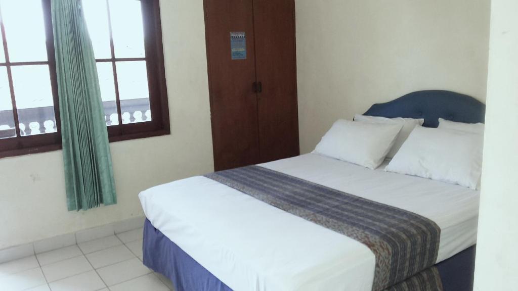 Mustika Inn Kuta Lombok Quarto foto