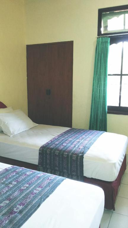 Mustika Inn Kuta Lombok Quarto foto
