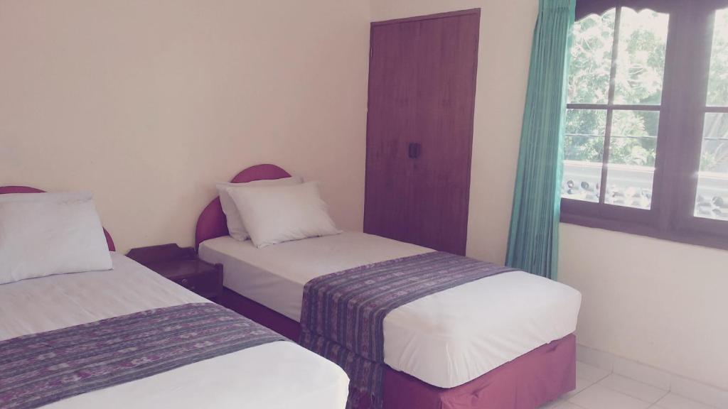 Mustika Inn Kuta Lombok Quarto foto